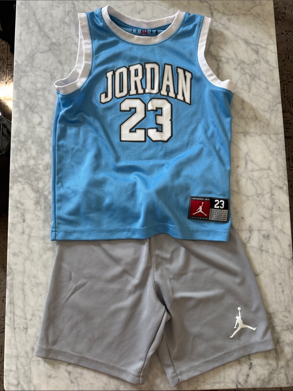 Jordan 23 boys Light Blue and White Basketball Tank jersey Gray Shorts 5-6T
